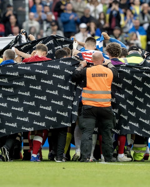 Denmark and Ukraine players surrounding Christian Eriksen after he collapsed at Nature Energy Park Odense June 2026