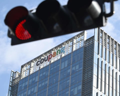 Coupang logo at the company's Seoul headquarters as South Korea hands it a record 409 million dollar data breach fine