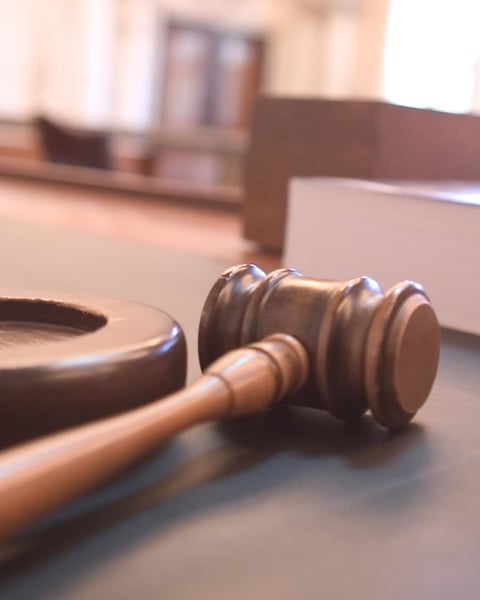 A courtroom gavel, illustrating a court ruling in the xAI OpenAI lawsuit