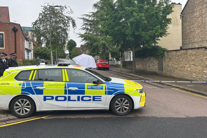 Police cordon near Dale Grove Finchley north London where 19-year-old woman was shot dead