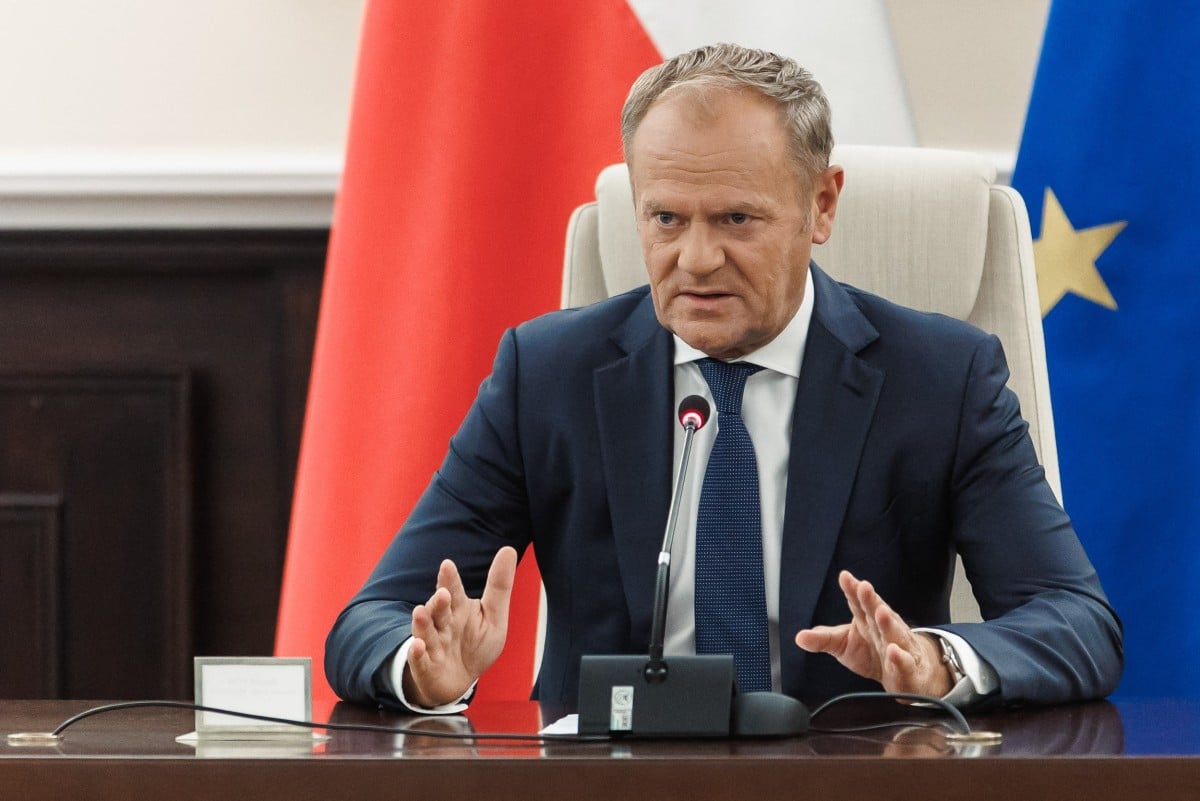 Polish Prime Minister Donald Tusk leads a meeting in Warsaw