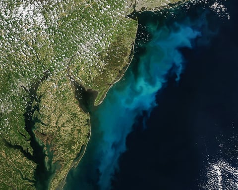 NASA Aqua MODIS satellite image of phytoplankton bloom off Mid-Atlantic coast Delaware New Jersey Maryland Virginia May 3 2026