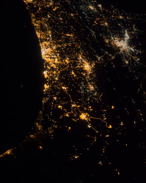 NASA astronaut photograph from ISS of eastern Mediterranean coastline at night showing Tel Aviv Jerusalem Amman July 22 2014