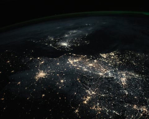 Aerial night photograph of Birmingham, United Kingdom showing the city's lights with Edgbaston Stadium district in the south, taken from the International Space Station
