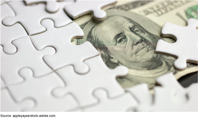 White puzzle pieces obscuring a US hundred dollar bill symbolizing shell company opacity and money laundering risks