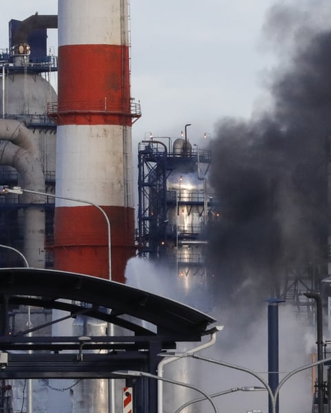 Smoke billows from a Gazprom Neft oil refinery in Russia