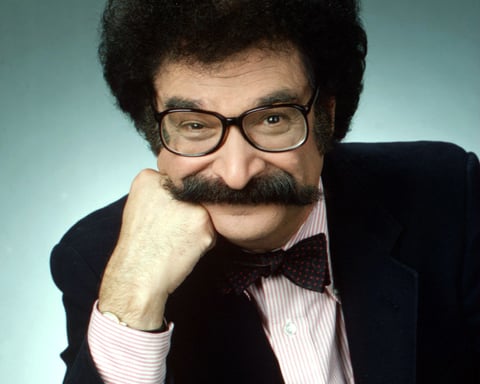 Gene Shalit NBC Today Show film critic with signature mustache bow tie and oversized glasses