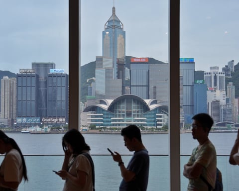 Hong Kong Central financial district skyline as the government gazettes zero percent tax on fund manager performance bonuses