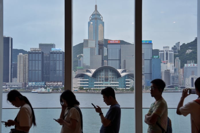 Hong Kong Central financial district skyline as the government gazettes zero percent tax on fund manager performance bonuses