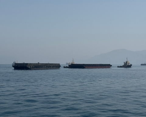 Oil tankers lined up in the Persian Gulf unable to transit the Strait of Hormuz