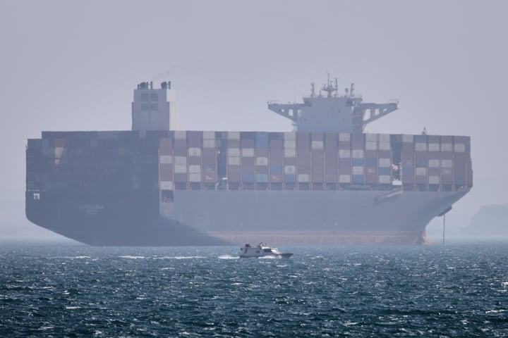 A container ship anchored in the Strait of Hormuz off Bandar Abbas, Iran