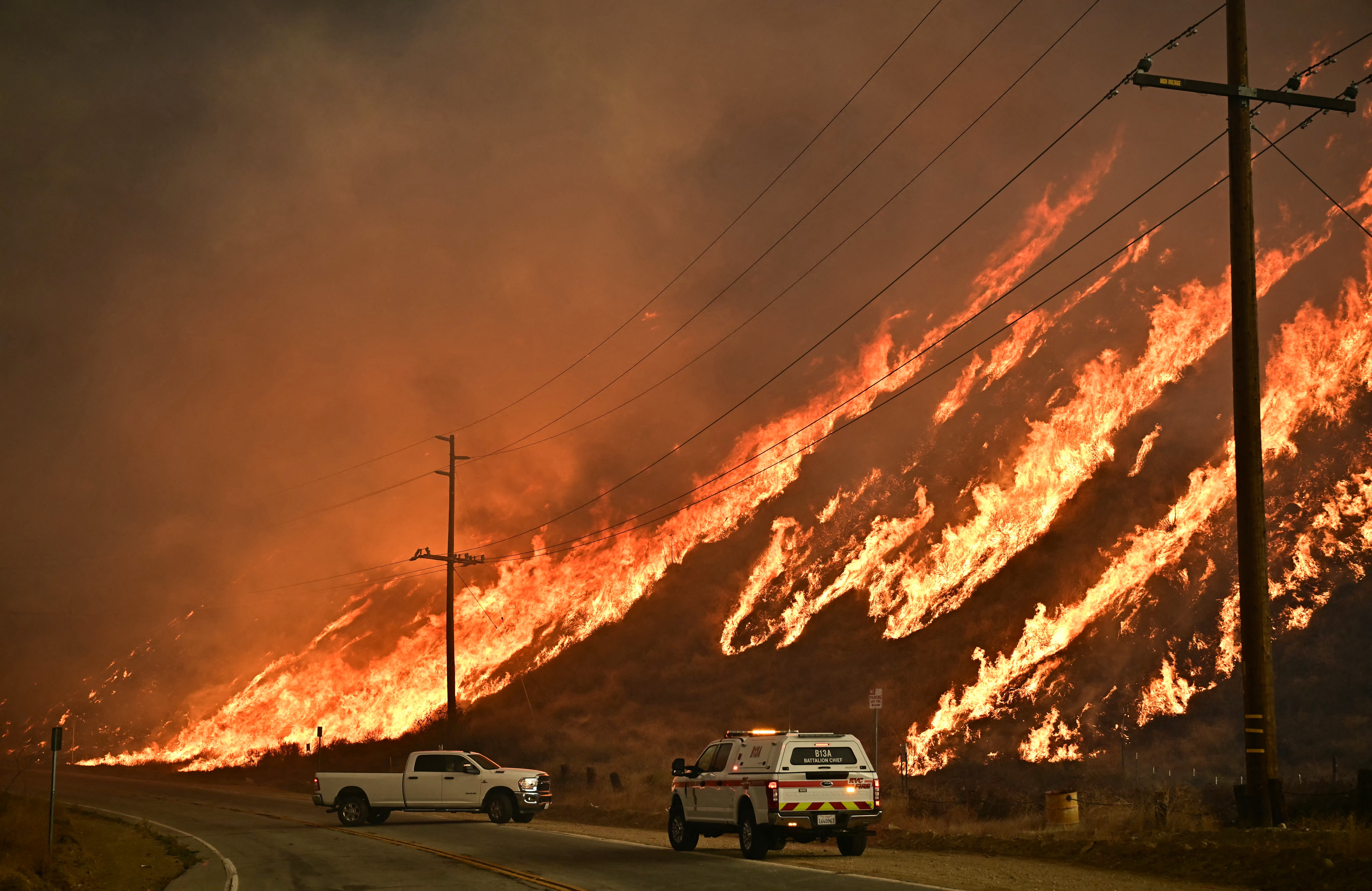 Emergency vehicles at the scene of the Hughes Fire in Castaic north of Los Angeles, the kind of large wildfire driving the rising ozone trend