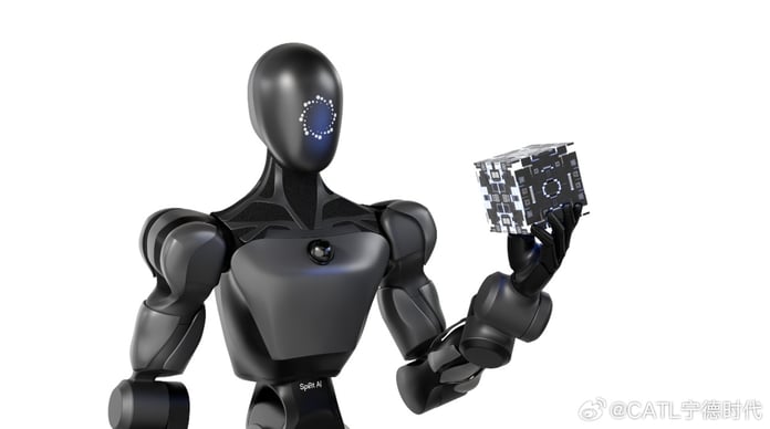 A Xiaomo humanoid robot working on an electric-vehicle battery assembly line