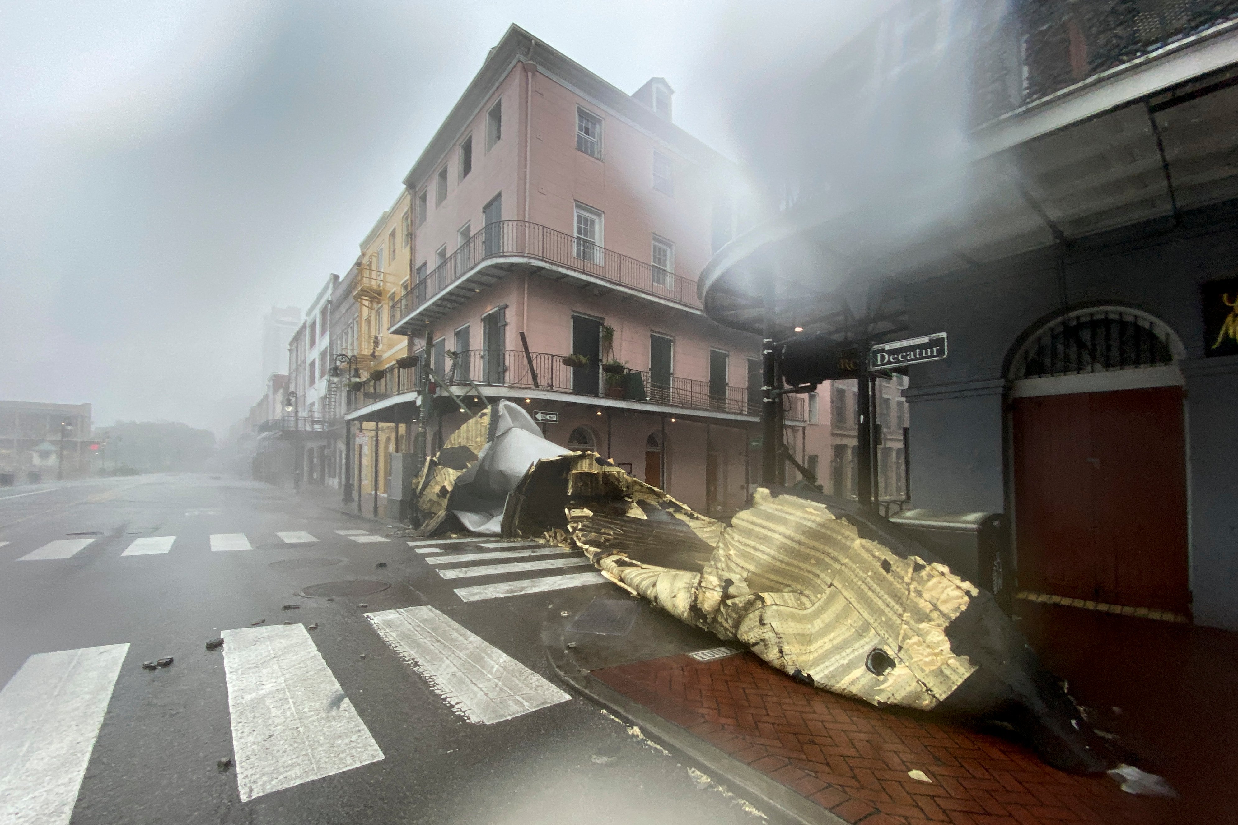 A section of a building's roof torn off by Hurricane Ida's winds in the French Quarter of New Orleans, the kind of storm damage Louisiana parishes have sued over