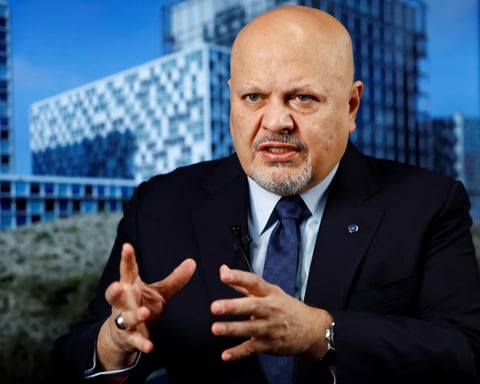 ICC Prosecutor Karim Khan at a press conference in The Hague ahead of his formal suspension