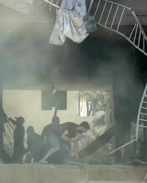 Smoke rises over Dahieh, Beirut's southern suburb, following an Israeli airstrike targeting a Hezbollah command center on June 14, 2026