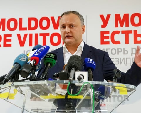 Former Moldovan President Igor Dodon speaks to reporters warning that Moldova-Romania unification would collapse the state