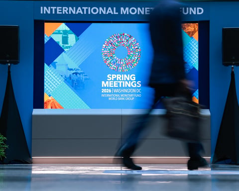 Delegates walk through the atrium at the IMF and World Bank Spring Meetings in Washington DC, April 14, 2026