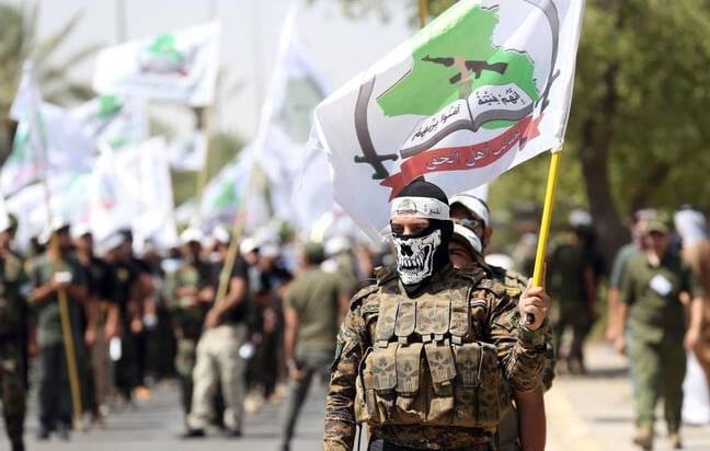 Iran-backed militia members in Iraq