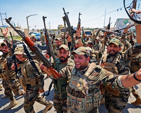 Iraqi Popular Mobilization Forces fighters