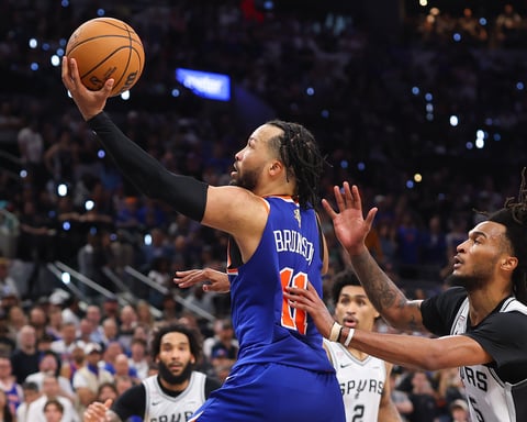 Jalen Brunson celebrates as New York Knicks win NBA championship at Frost Bank Center San Antonio June 13 2026