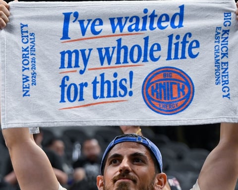 New York Knicks players celebrate on the court after winning the 2026 NBA championship over the San Antonio Spurs