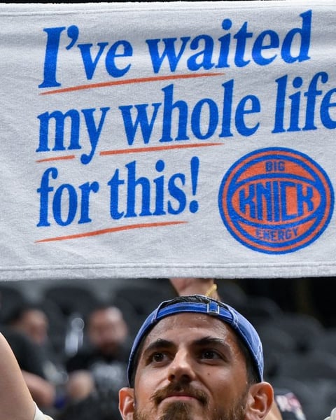 New York Knicks players celebrate on the court after winning the 2026 NBA championship over the San Antonio Spurs
