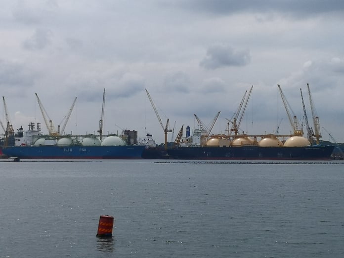 LNG carriers at anchor off Singapore, the kind of vessels that will move Malaysian gas to Japan under the new Petronas-JERA deal