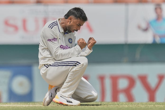 Manav Suthar celebrates his maiden Test wicket against Afghanistan in New Chandigarh