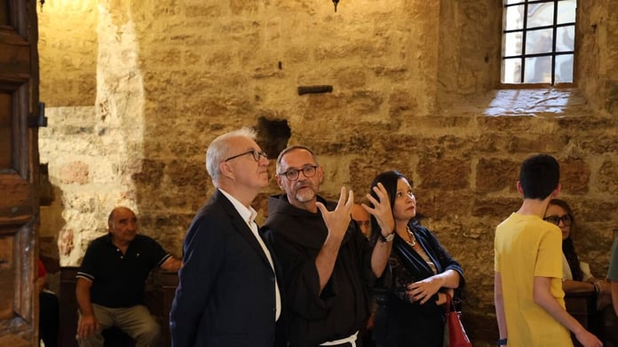 Alfredo Mantovano Italian Undersecretary speaking at Assisi conference on international tensions June 2026