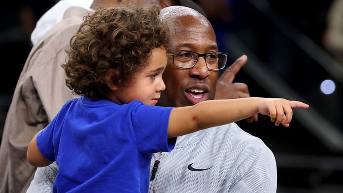 Mike Brown laughs and celebrates on the court after the New York Knicks win the 2026 NBA Championship at Frost Bank Center