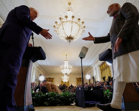 US President Donald Trump and Indian Prime Minister Narendra Modi shake hands at a joint press conference at the White House in Washington in February 2025
