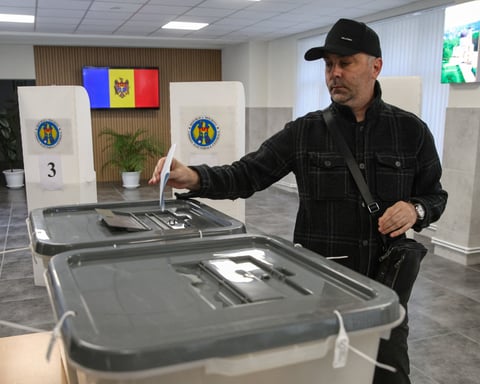 Moldovan voters at a polling station in Chisinau during the September 2025 parliamentary elections