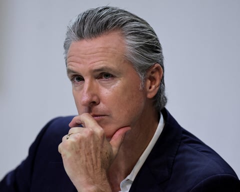 California Governor Gavin Newsom attends a news conference during the UN Climate Change Conference in Belem, Brazil, after Trump-era rollbacks of state emissions rules