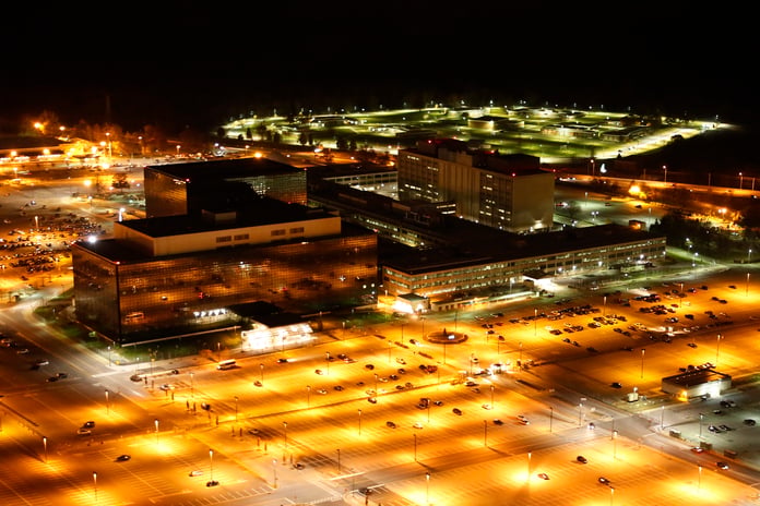 Aerial view of NSA headquarters at Fort Meade, whose Section 702 collection continues despite the statute's lapse