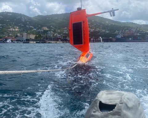 An ocean monitoring drone being deployed at sea