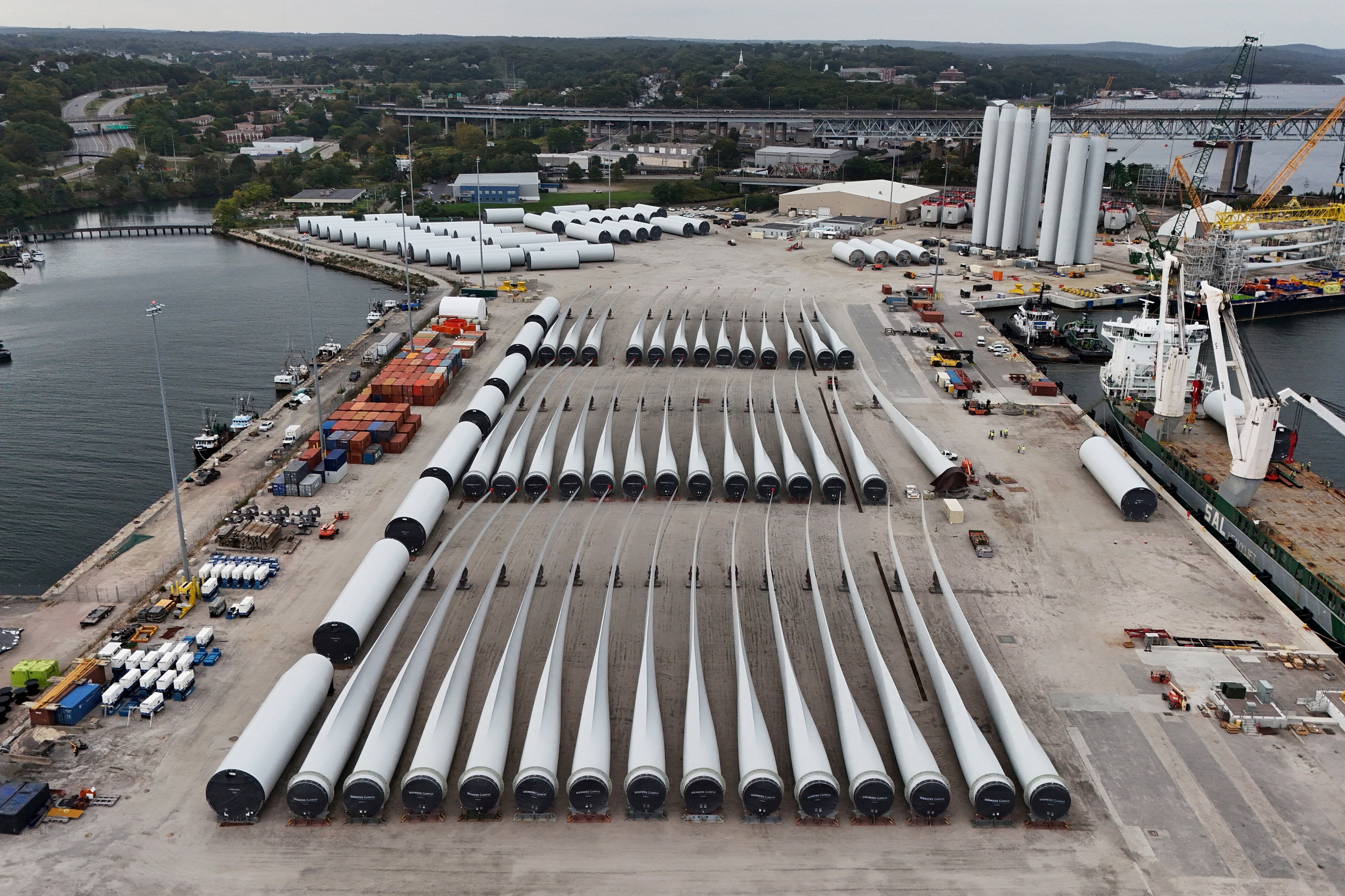 Rotor blades and parts staged on the State Pier in New London, Connecticut, for the Revolution Wind offshore project being built off Rhode Island