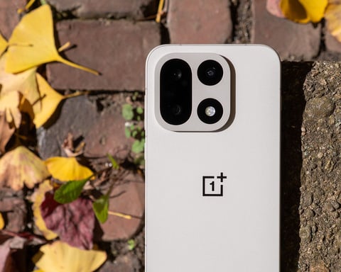 OnePlus 15 in Sand Storm colorway showing redesigned square camera module