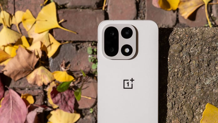 OnePlus 15 in Sand Storm colorway showing redesigned square camera module