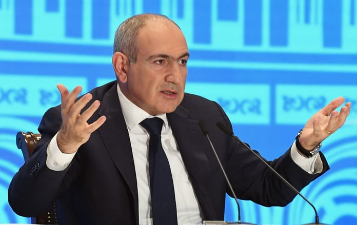 Armenian Prime Minister Nikol Pashinyan at a press event amid Armenia EAEU EU membership debate 2026