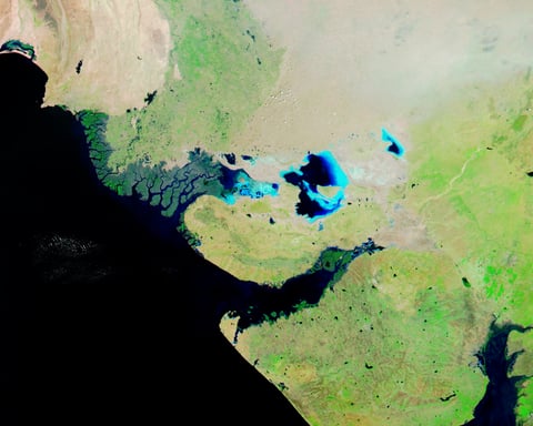 NASA MODIS satellite image of the Rann of Kutch in Gujarat India during the dry season showing the white salt desert extending across northwestern Gujarat state