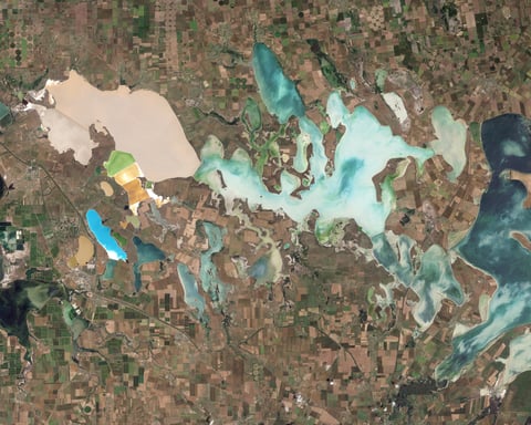 NASA Landsat 5 Thematic Mapper natural-color satellite image of the Sivash salt lagoons between the Black Sea and the Sea of Azov showing the narrow Perekop Isthmus that connects Crimea to mainland Ukraine and the Armiansk bridge corridor