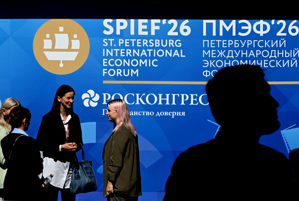 Attendees in front of SPIEF 2026 branding at St. Petersburg International Economic Forum
