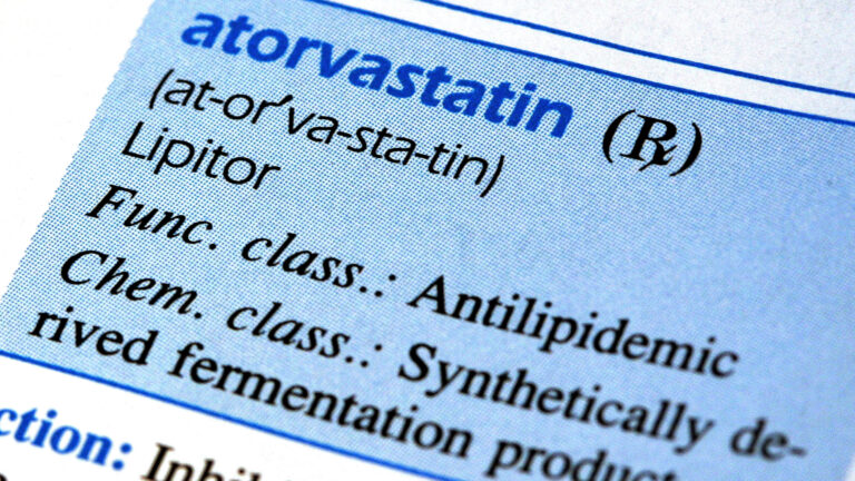 Close-up of statin pills used to lower LDL cholesterol and reduce cardiovascular risk