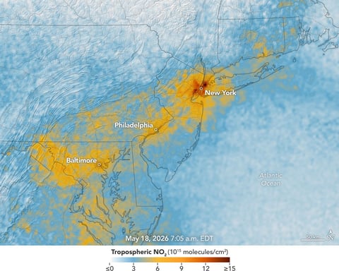 NASA TEMPO satellite image showing high morning nitrogen dioxide and reduced afternoon levels along the New York-Washington corridor on May 18, 2026