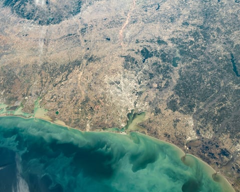 NASA astronaut photograph from ISS of Texas Gulf Coast centered on Houston showing barrier islands and Lavaca Bay December 2020