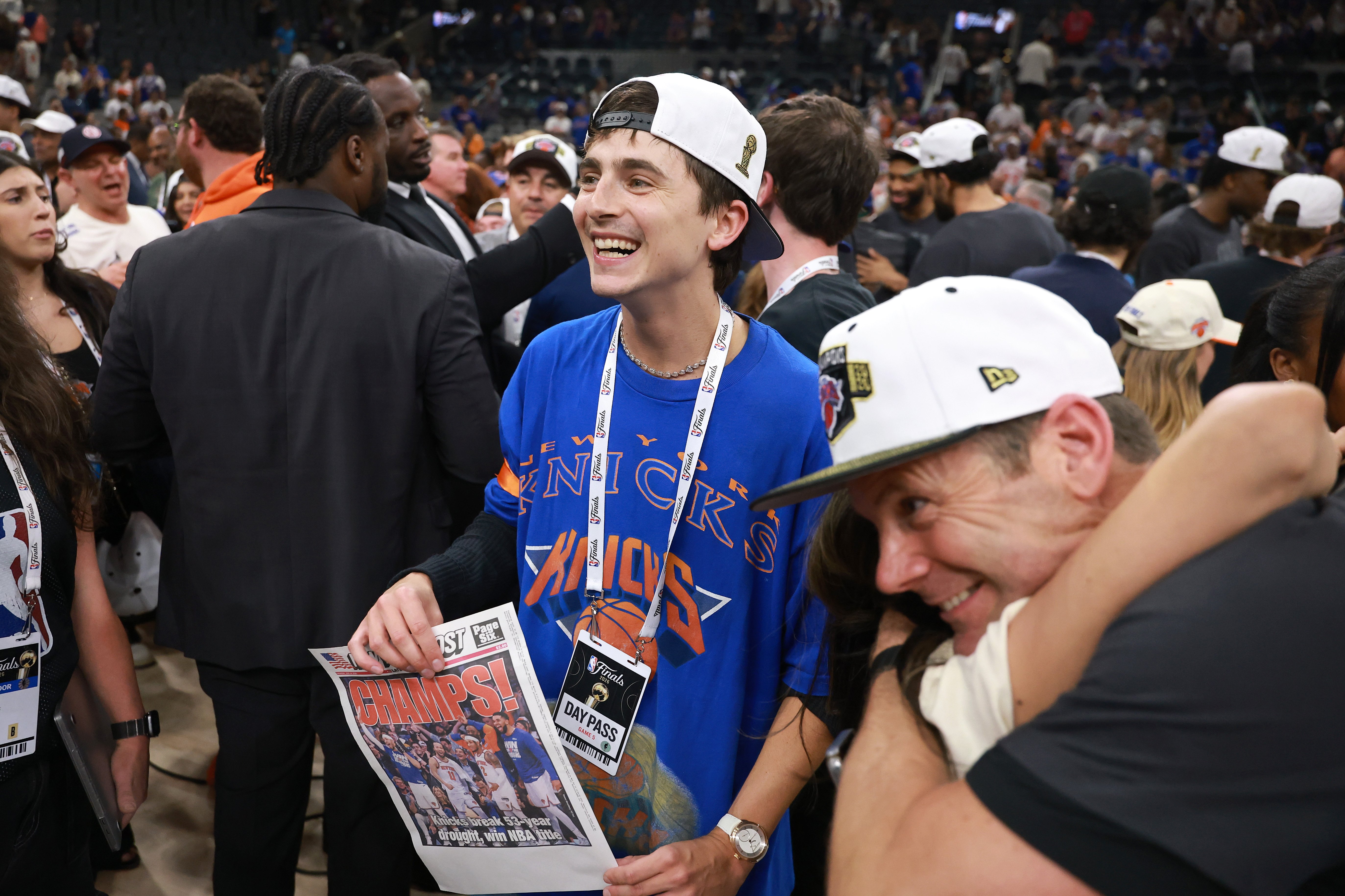 Timothee Chalamet celebrating as the New York Knicks win the 2026 NBA Finals at Frost Bank Center in San Antonio