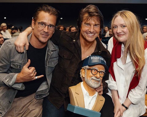 Tom Cruise smiling at the Disclosure Day screening alongside his Spielberg co-stars