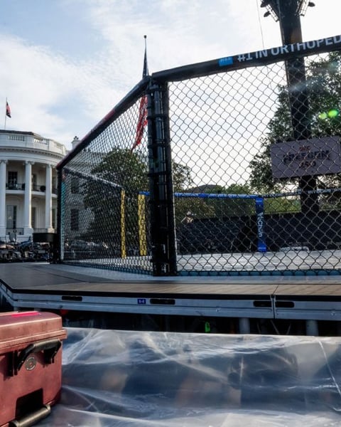 UFC stage construction on the White House South Lawn for Freedom 250 fight night