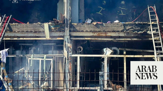 Ukrainian emergency personnel at a site damaged by Russian drone strike in Ukraine June 7 2026